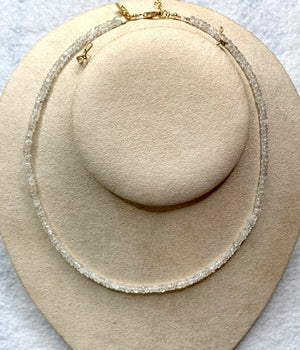 #582 white zircon strung 15” necklace