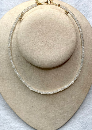 #581 white zircon strung 14” necklace