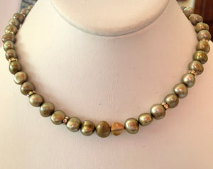#152 Olive green strung pearls
