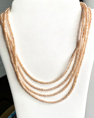 #258 beige pearls strung 66.5” necklace