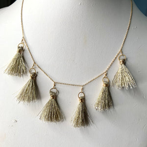 #149 gold tassels necklace