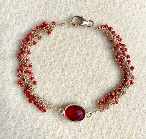#302 Bezeled garnet/seed bead cluster bracelet