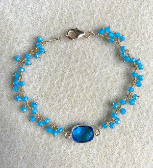 #304 bezeled apatite blue/Quartz dangle bracelet