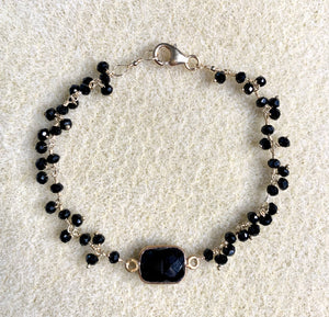 #305  black onyx Bezeled dangle bracelet
