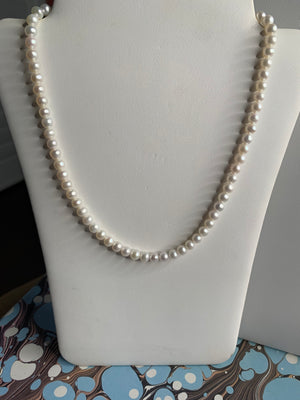 #261 5mm white pearls strung necklace