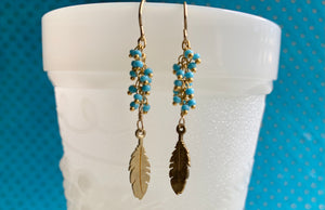 #102 feather with blue quartz